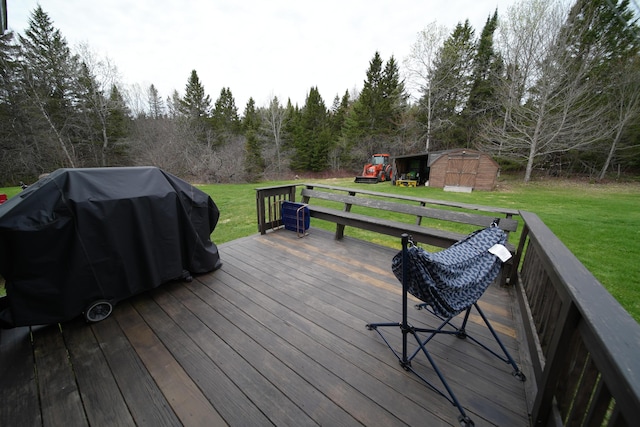 176 Smyrna Center Rd, Smyrna, ME 04780 - wooden terrace featuring a storage shed, a yard, an outbuilding, and area for grilling