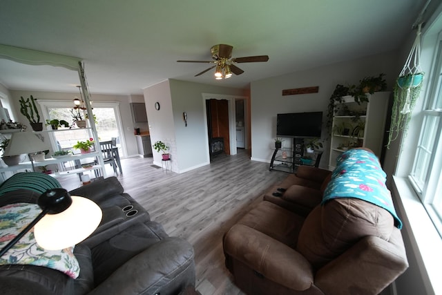 176 Smyrna Center Rd, Smyrna, ME 04780 - living area featuring a ceiling fan, wood finished floors, and baseboards