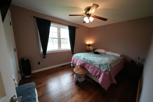176 Smyrna Center Rd, Smyrna, ME 04780 - bedroom featuring wood finished floors, baseboards, and ceiling fan