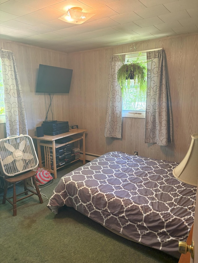 863 Sturtevant Hill Rd, Winthrop, ME 04364 - carpeted bedroom with wood walls and baseboard heating