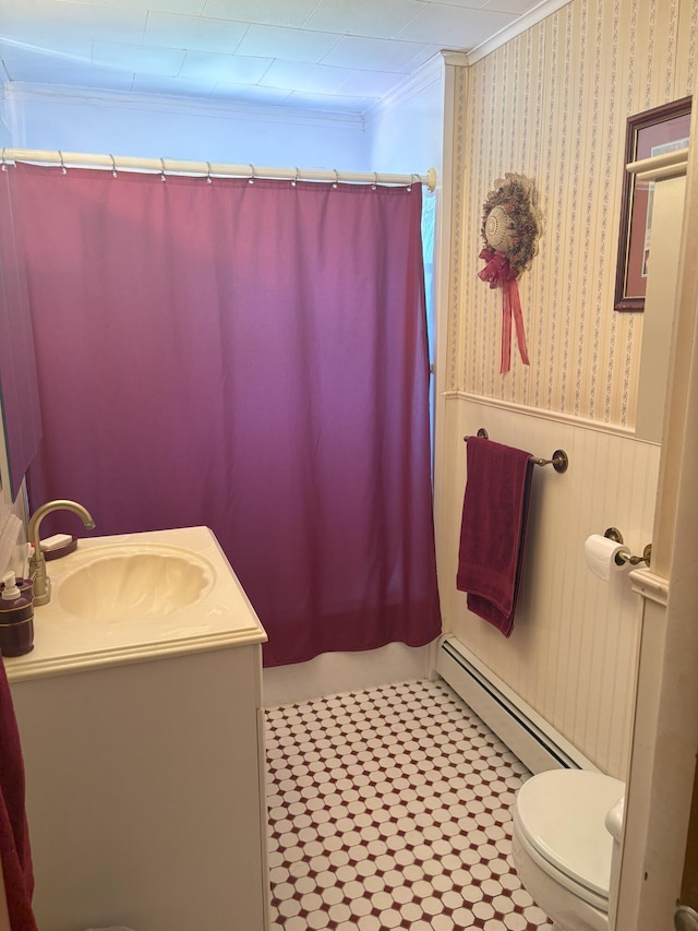 863 Sturtevant Hill Rd, Winthrop, ME 04364 - bathroom featuring ornamental molding, a wainscoted wall, a baseboard heating unit, toilet, and a shower with curtain