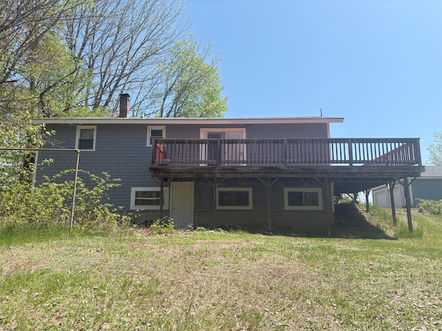 863 Sturtevant Hill Rd, Winthrop, ME 04364 - back of property featuring a deck, a chimney, and a lawn