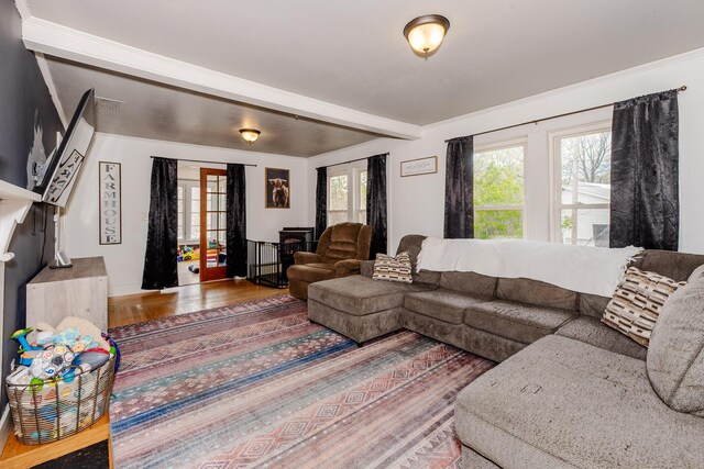 10 River St, Strong, ME 04983 - living area featuring wood finished floors and beamed ceiling