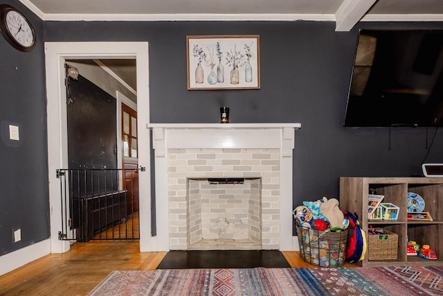 10 River St, Strong, ME 04983 - living area featuring a fireplace, crown molding, and parquet flooring