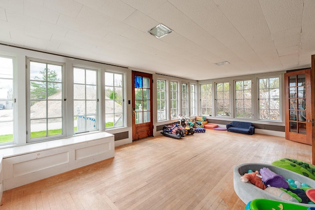 10 River St, Strong, ME 04983 - sunroom / solarium with plenty of natural light and hardwood / wood-style flooring