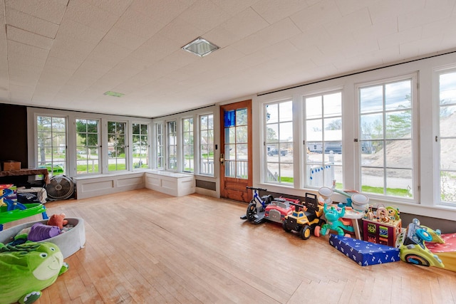 10 River St, Strong, ME 04983 - sunroom / solarium with french doors, healthy amount of natural light, and wood finished floors