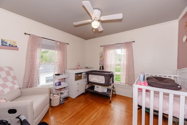 10 River St, Strong, ME 04983 - bedroom featuring ornamental molding, ceiling fan, and light wood-style floors