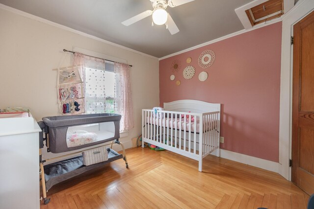 10 River St, Strong, ME 04983 - bedroom with ornamental molding, ceiling fan, a nursery area, and baseboards