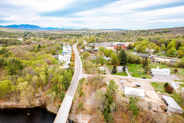 10 River St, Strong, ME 04983 - drone / aerial view of a water and mountain view and a heavily wooded area