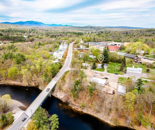 10 River St, Strong, ME 04983 - aerial view of property's location featuring a water and mountain view and a forest