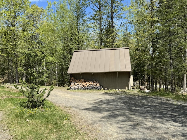 898 Sebec Village Rd, Sebec, ME 04481 - view of outdoor structure with an outdoor structure and a view of trees