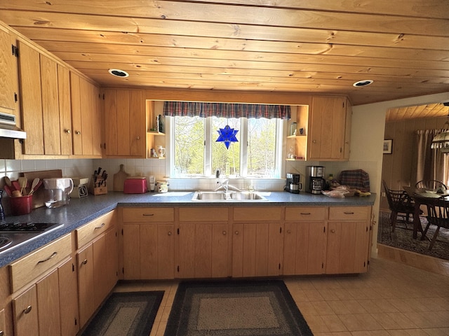 898 Sebec Village Rd, Sebec, ME 04481 - kitchen featuring a sink, open shelves, wooden ceiling, decorative backsplash, and dark countertops