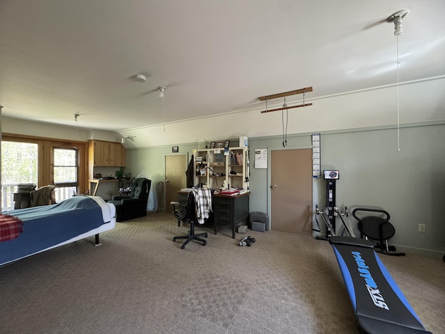 898 Sebec Village Rd, Sebec, ME 04481 - carpeted bedroom with lofted ceiling and a desk