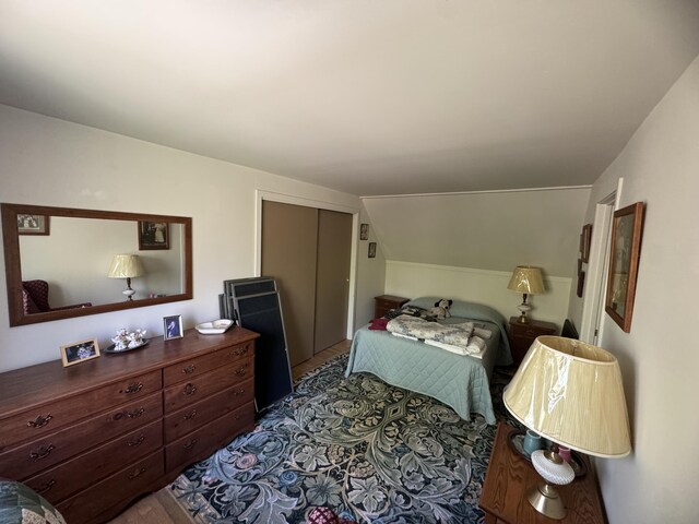 898 Sebec Village Rd, Sebec, ME 04481 - bedroom featuring a closet and lofted ceiling