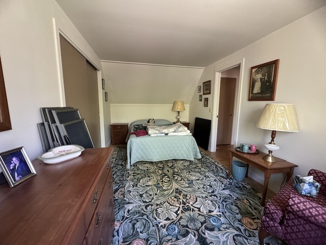 898 Sebec Village Rd, Sebec, ME 04481 - bedroom featuring lofted ceiling and a closet