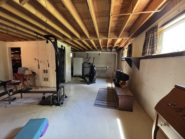 898 Sebec Village Rd, Sebec, ME 04481 - below grade area with freestanding refrigerator