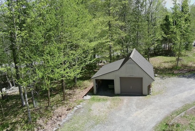 898 Sebec Village Rd, Sebec, ME 04481 - garage with a detached garage and driveway
