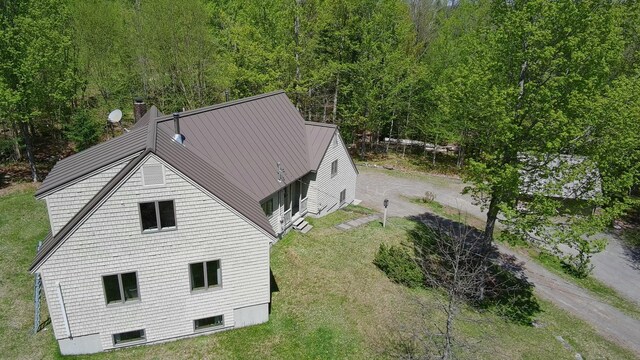 898 Sebec Village Rd, Sebec, ME 04481 - view of subject property featuring a forest