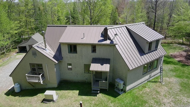 898 Sebec Village Rd, Sebec, ME 04481 - back of property featuring a standing seam roof and metal roof
