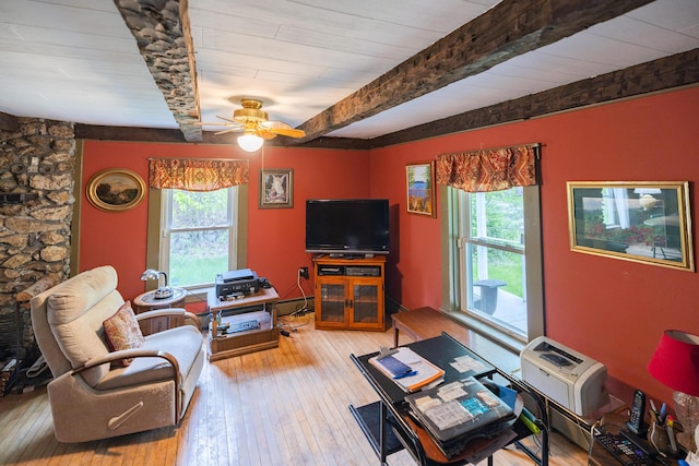 168 Beech Hill Rd, Auburn, ME 04210 - living area featuring beamed ceiling, healthy amount of natural light, ceiling fan, and wood-type flooring