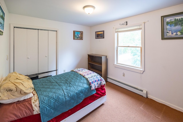168 Beech Hill Rd, Auburn, ME 04210 - carpeted bedroom with a baseboard heating unit, a closet, and baseboards
