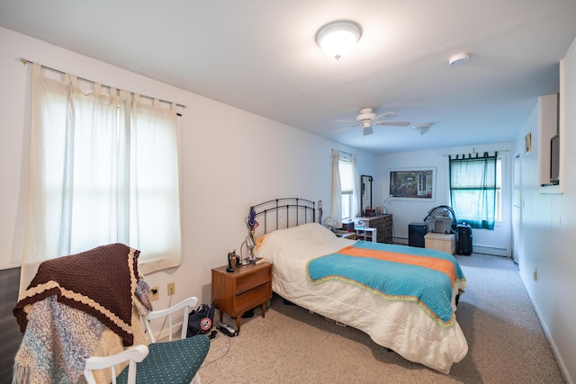 168 Beech Hill Rd, Auburn, ME 04210 - carpeted bedroom featuring a baseboard heating unit, baseboards, and ceiling fan