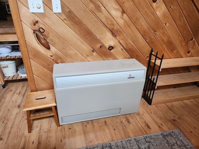 227 Brooks Pond Dr, Corinna, ME 04928 - detailed view of wood finished floors and heating unit