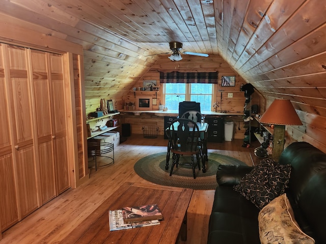 227 Brooks Pond Dr, Corinna, ME 04928 - home office with light wood-style flooring, wooden walls, vaulted ceiling, wood ceiling, and ceiling fan