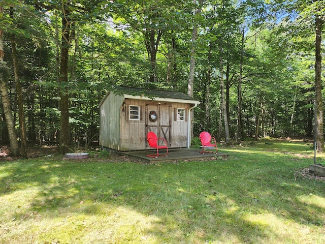 227 Brooks Pond Dr, Corinna, ME 04928 - view of shed with a wooded view
