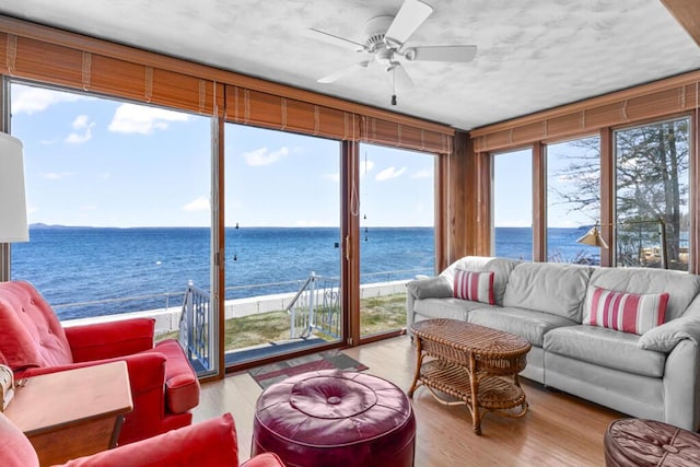 73 Wards Cove Rd, Standish, ME 04084 - sunroom featuring a water view and wood finished floors