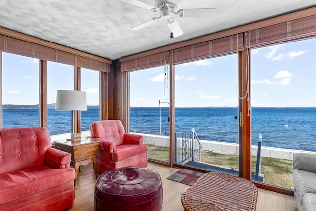73 Wards Cove Rd, Standish, ME 04084 - sunroom with a water view and wood finished floors