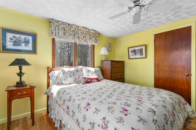73 Wards Cove Rd, Standish, ME 04084 - bedroom with wood finished floors, baseboards, ceiling fan, and ornamental molding