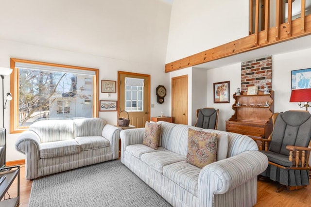 73 Wards Cove Rd, Standish, ME 04084 - living room with light wood-style flooring and a high ceiling