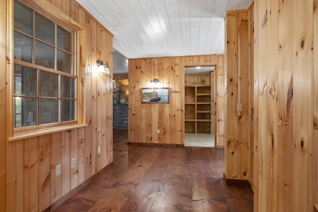 389 Castle Island Rd, Belgrade, ME 04917 - corridor with wooden walls and hardwood / wood-style floors
