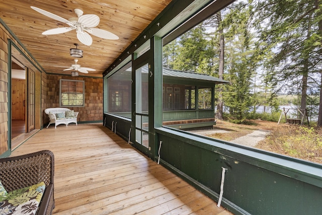 389 Castle Island Rd, Belgrade, ME 04917 - unfurnished sunroom featuring ceiling fan