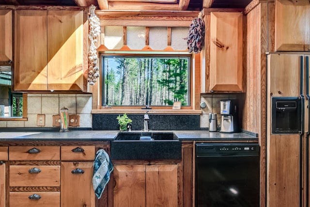 890 Salem Rd, Freeman Twp, ME 04983 - kitchen featuring black dishwasher, a sink, refrigerator with ice dispenser, dark countertops, and tasteful backsplash