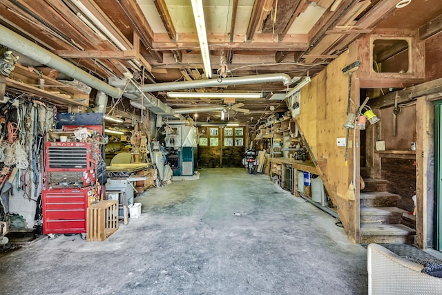 890 Salem Rd, Freeman Twp, ME 04983 - below grade area with a workshop area