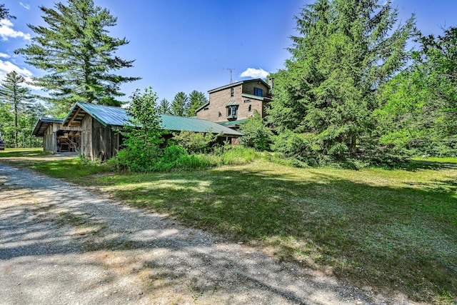 890 Salem Rd, Freeman Twp, ME 04983 - view of grassy yard featuring driveway
