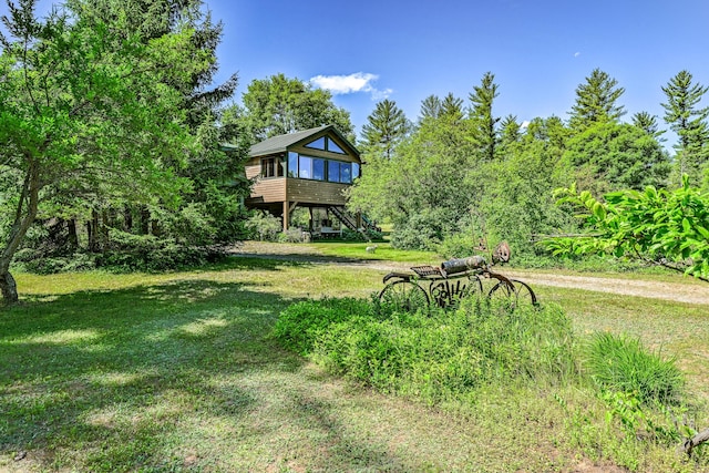 890 Salem Rd, Freeman Twp, ME 04983 - view of green lawn featuring stairway