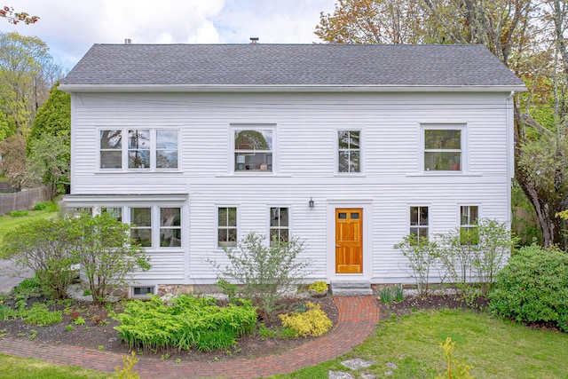 288 Foreside Rd, Falmouth, ME 04105 - view of front of property featuring a shingled roof, a front lawn, and entry steps