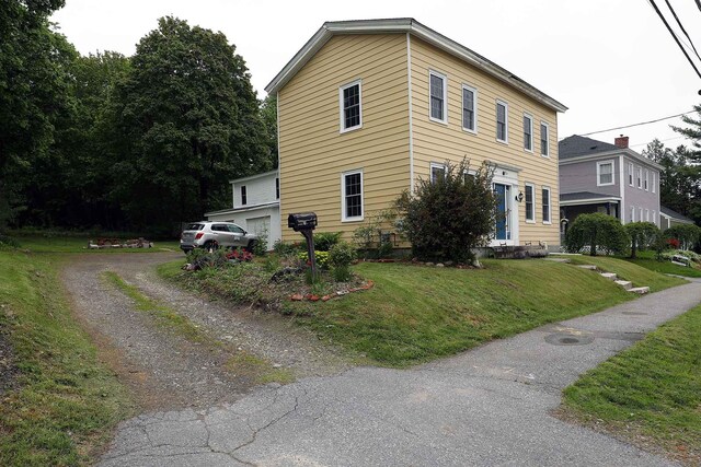 7 Middle St, Hallowell, ME 04347 - view of side of home featuring a yard