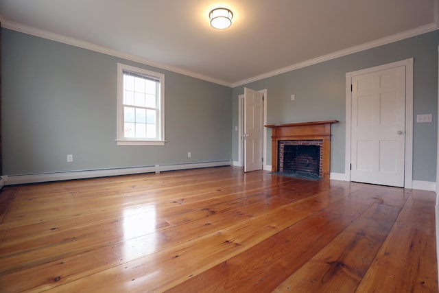 7 Middle St, Hallowell, ME 04347 - unfurnished living room with ornamental molding, a baseboard radiator, a brick fireplace, hardwood / wood-style flooring, and baseboards