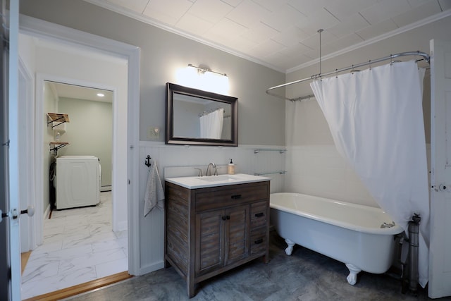 7 Middle St, Hallowell, ME 04347 - bathroom featuring marble finish flooring, crown molding, vanity, wainscoting, and washer and dryer