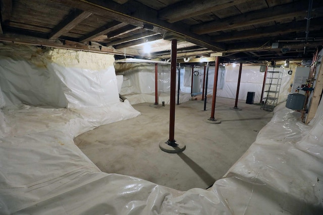 7 Middle St, Hallowell, ME 04347 - unfinished below grade area with a water pressure tank and gas water heater