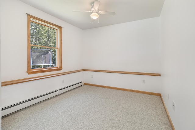 320 Grove St, Lewiston, ME 04240 - carpeted empty room with a baseboard heating unit and ceiling fan