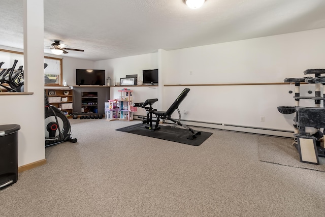 320 Grove St, Lewiston, ME 04240 - exercise area with ceiling fan, baseboard heating, and carpet floors