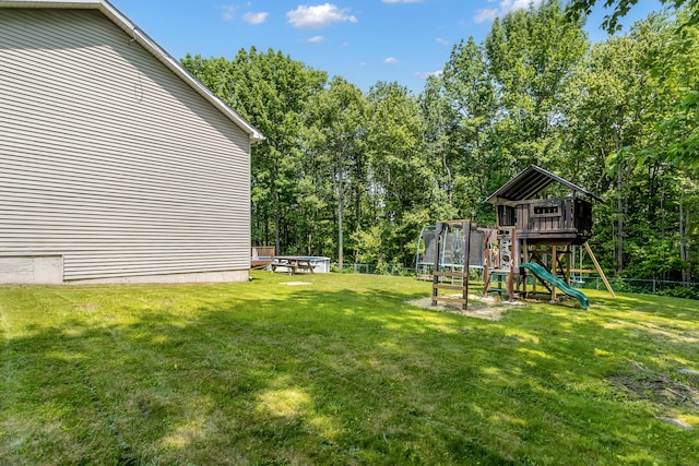 320 Grove St, Lewiston, ME 04240 - view of yard featuring a trampoline and a playground