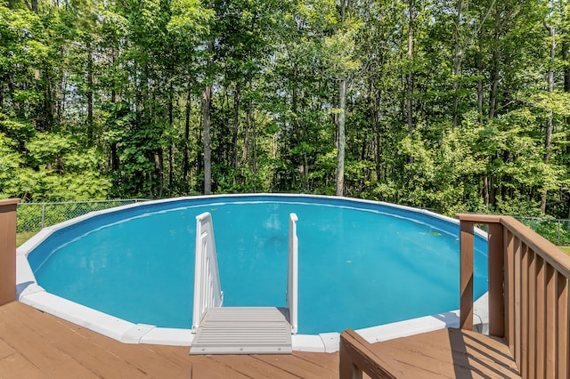 320 Grove St, Lewiston, ME 04240 - view of swimming pool featuring a wooden deck