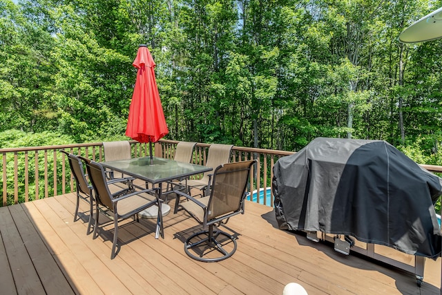 320 Grove St, Lewiston, ME 04240 - deck with outdoor dining space and a grill