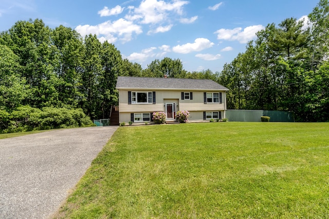 320 Grove St, Lewiston, ME 04240 - raised ranch with a front lawn and driveway